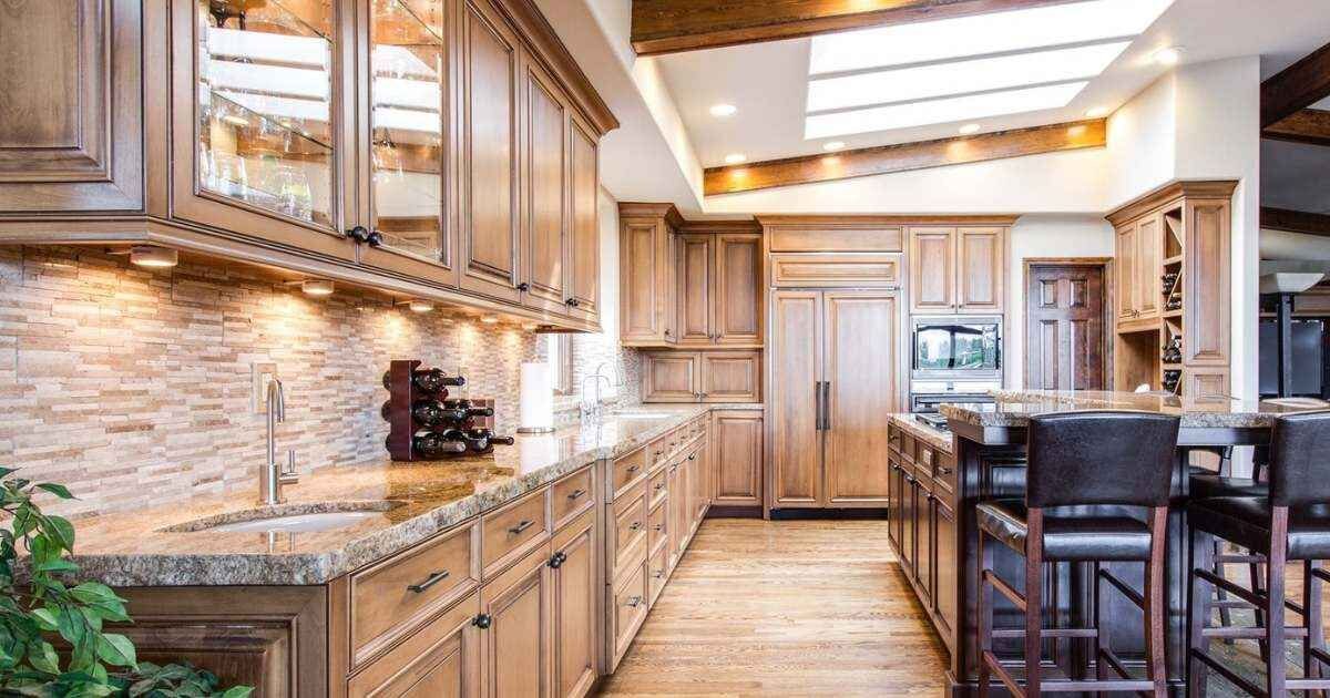 large light brown stained wooden kitchen 